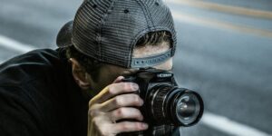 photographer setting up camera in private studio